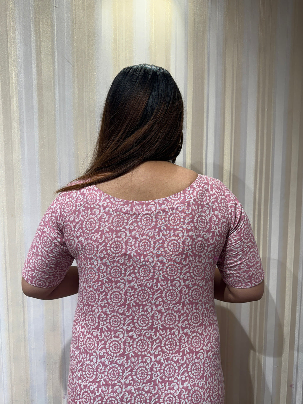 If being comfortable all day long is your first preference then this Cotton Knee Length Dress should be in your wardrobe. The unique Asymmetrical pattern makes you stand out. The perfect comfortable office wear dress to flaunt your beauty in style.