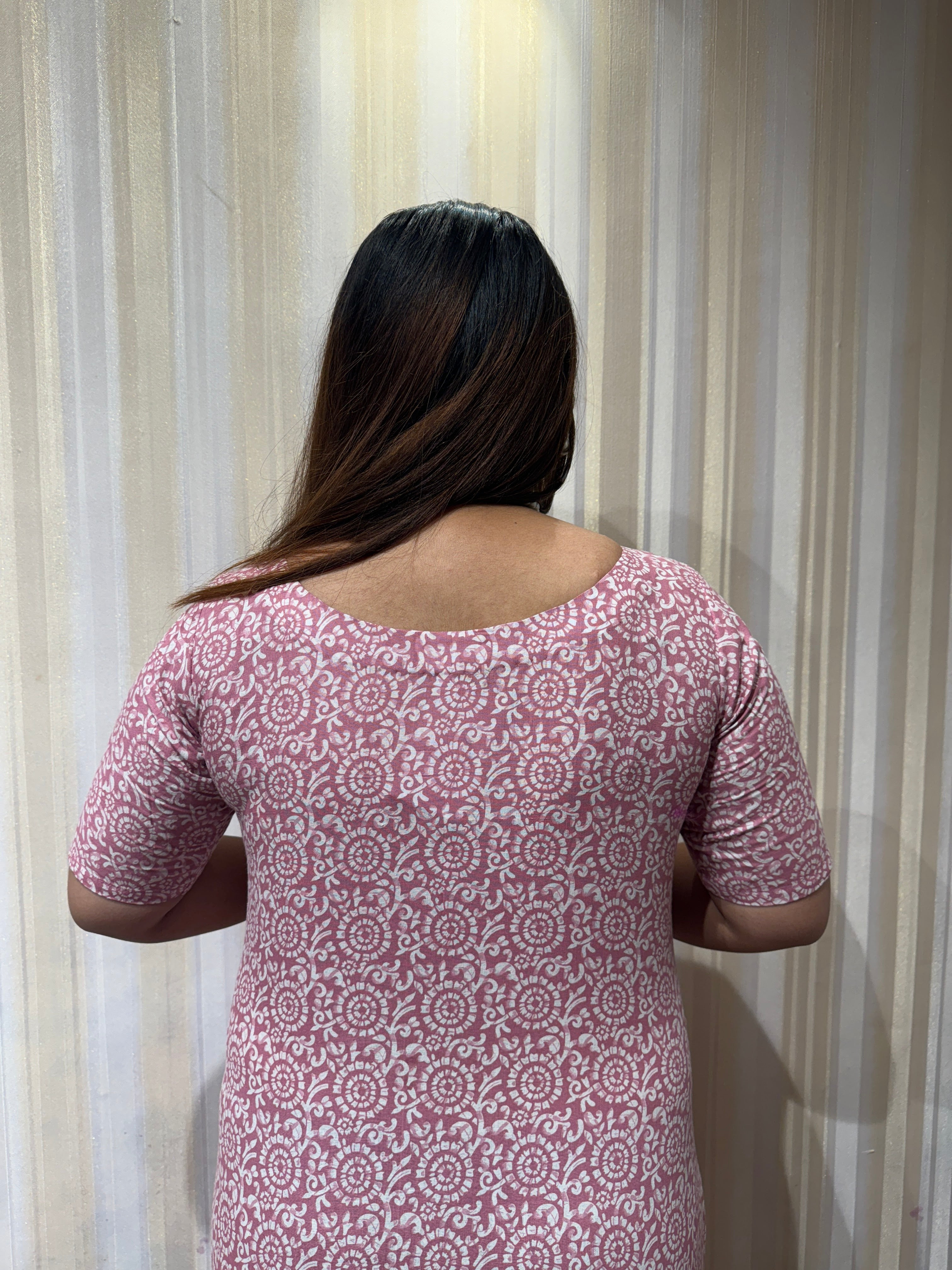 If being comfortable all day long is your first preference then this Cotton Knee Length Dress should be in your wardrobe. The unique Asymmetrical pattern makes you stand out. The perfect comfortable office wear dress to flaunt your beauty in style.