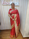 Make a bold statement with this bold Bloody Red Banarasi Ready to Wear Saree from Aura Drapes by Unbox Colours. Designed for effortless elegance & all-day comfort. Featuring rich red tones with luxurious golden sari detailing, this pre-stitched saree is perfect for weddings, house-warmings, festive celebrations, receptions, parties, Karwa Chauth, Diwali & special family celebrations. Traditional charm meets modern convenience-drape it in minute.