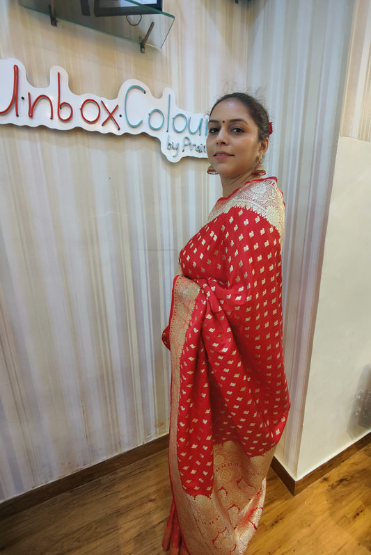 Make a bold statement with this bold Bloody Red Banarasi Ready to Wear Saree from Aura Drapes by Unbox Colours. Designed for effortless elegance & all-day comfort. Featuring rich red tones with luxurious golden sari detailing, this pre-stitched saree is perfect for weddings, house-warmings, festive celebrations, receptions, parties, Karwa Chauth, Diwali & special family celebrations. Traditional charm meets modern convenience-drape it in minute.