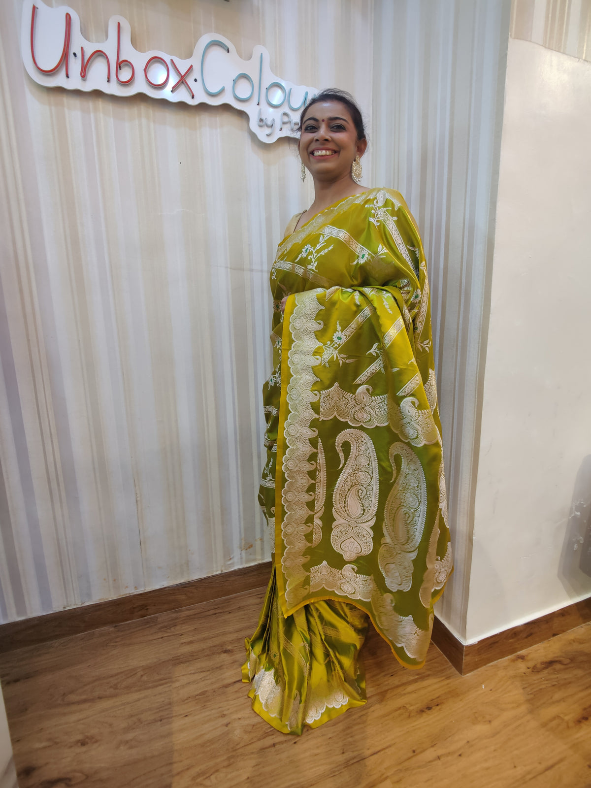 Turn Heads with Lime Green, a graceful Golden Zari Banarasi ready-to-wear Saree crafted for effortless style &amp; comfort. Featuring a rich lime green hue with elegant woven detailing, this pre-stitched saree is perfect for festive celebrations, wedding functions, receptions, haldi ceremonies, cultural events & party wear. A perfect blend of sophistication & convenience-drape it in minutes & shine beautifully at every special occasion.