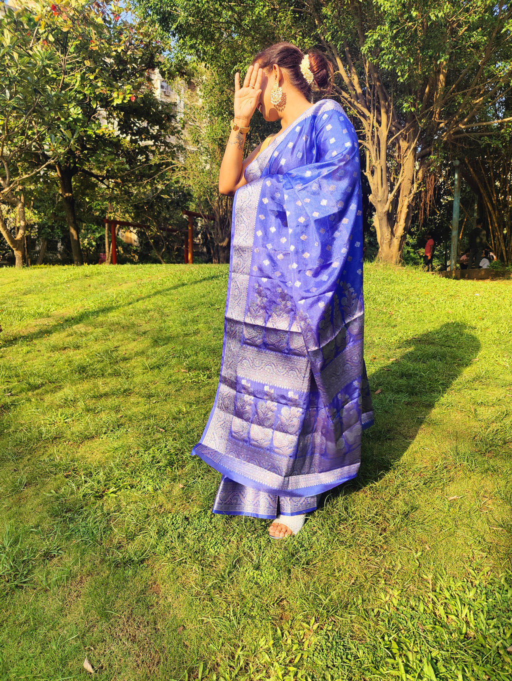 Grace every celebration with this Blue Ready-to-Wear Saree from Aura Drapes by Unbox Colours. This stunning Saree is crafted for effortless elegance & comfort. Featuring a rich Beautiful Blue shade with intricate woven detailing of Silver & Gold Zari. This pre-stitched saree is perfect for weddings, festive occasions, receptions, sangeet nights, family functions & party wear. Easy to drape & beautifully traditional, it’s designed to make you shine with confidence at every special moment.